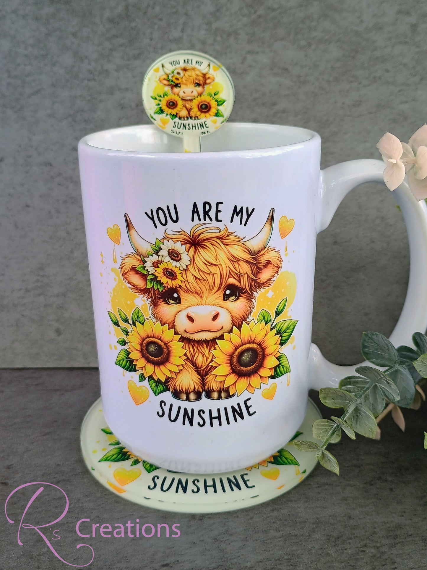 Highland cow and sunflower drinkware set.