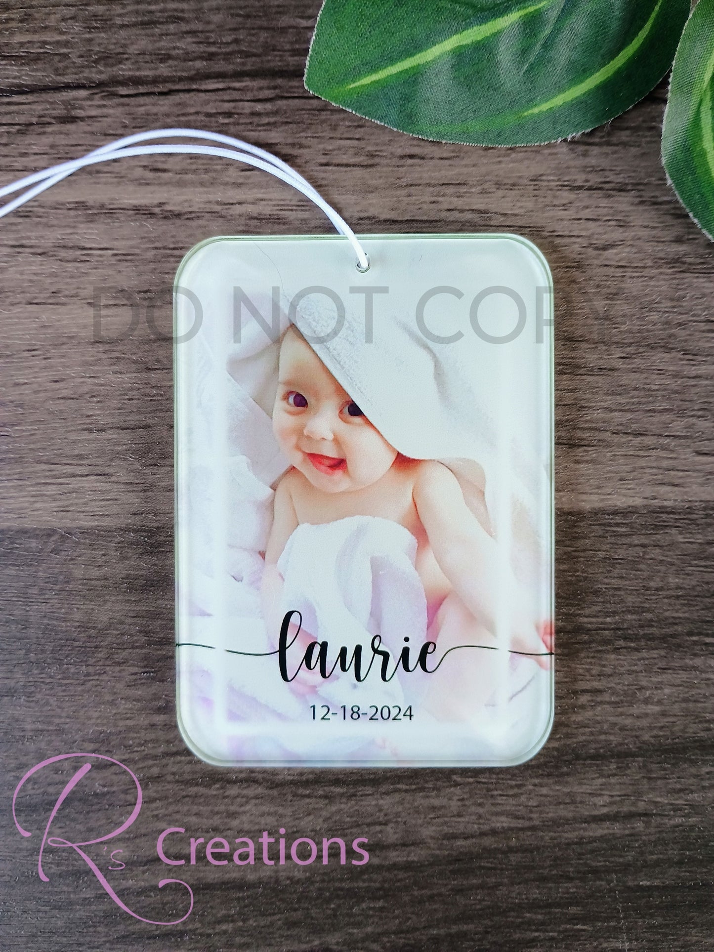 Customized rear view mirror acrylic hanger.