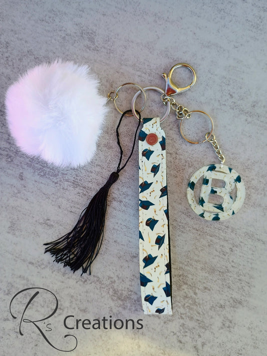 Customized PU leather lanyard, keychain, graduation, grad, pom poms