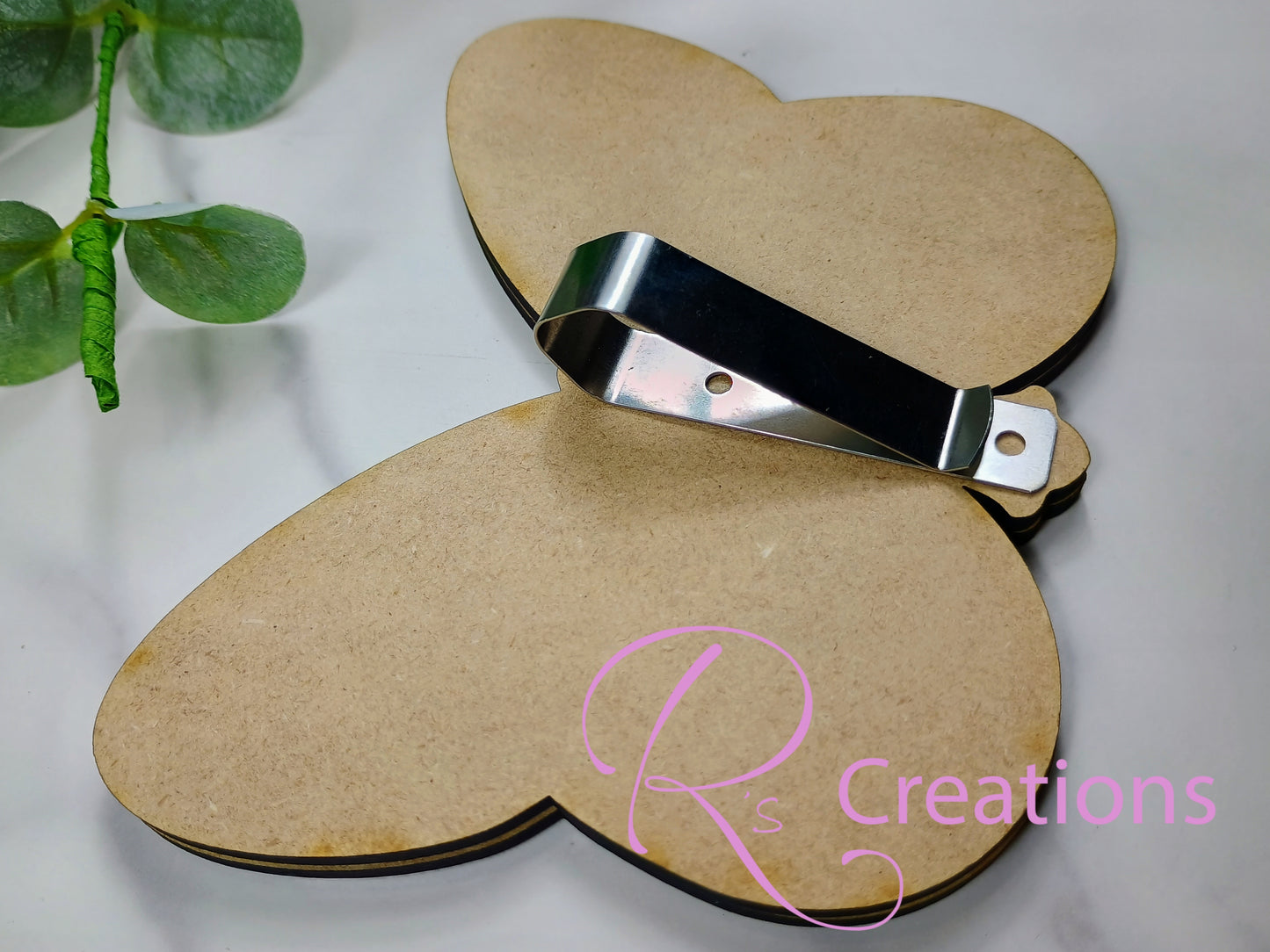 Butterfly visor clips for vehicles