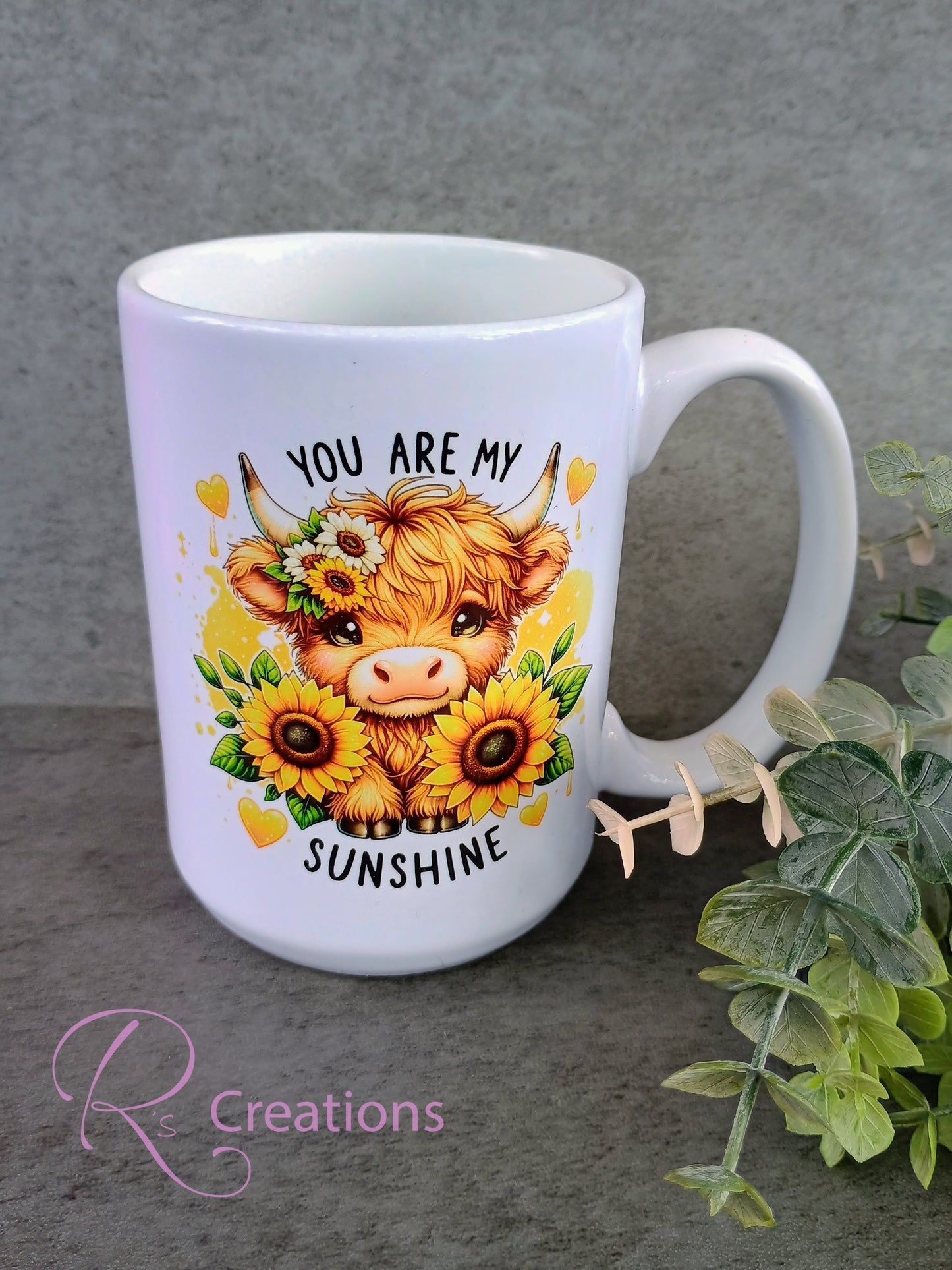 Highland cow and sunflower drinkware set.