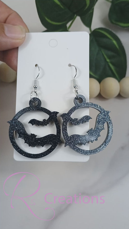 Bat acrylic black onyx glitter earrings.