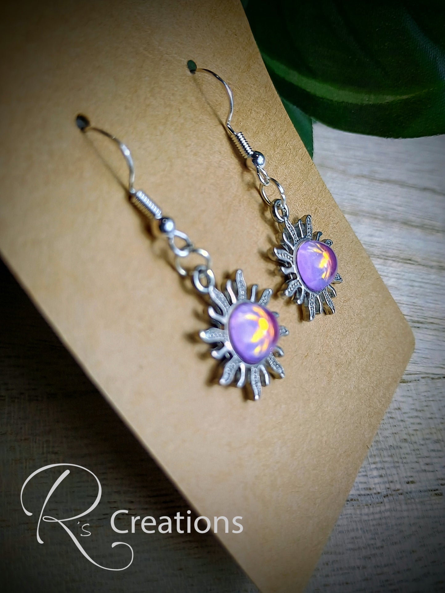 Pink and purple sun shaped earrings, dangle