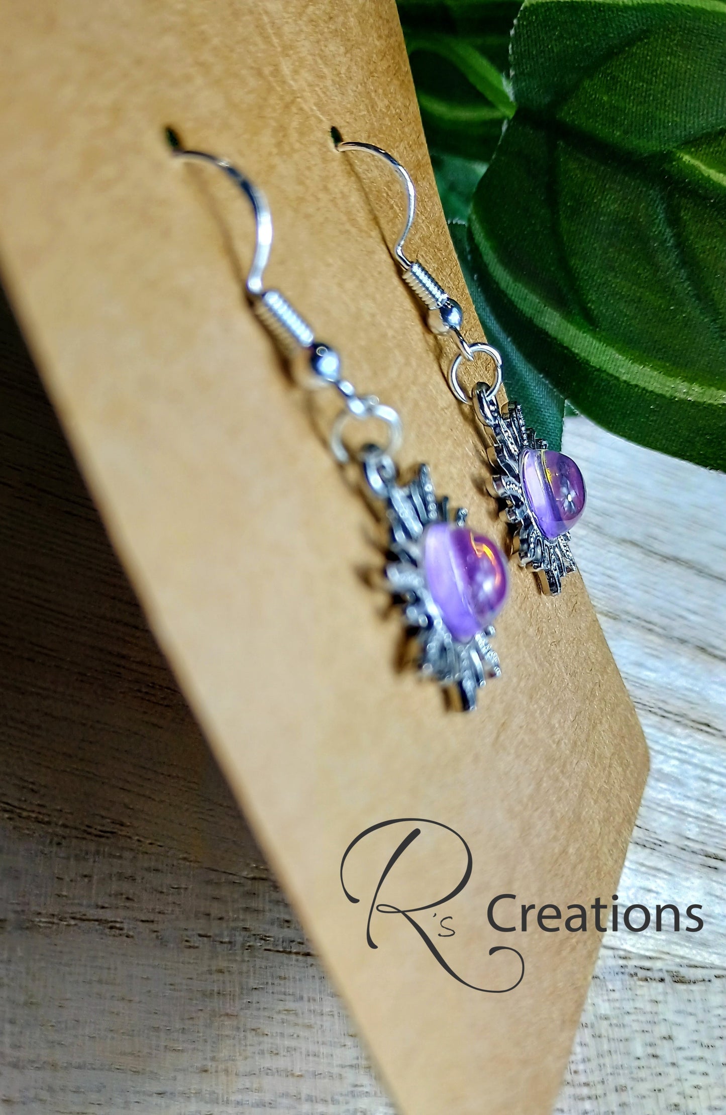 Pink and purple sun shaped earrings, dangle